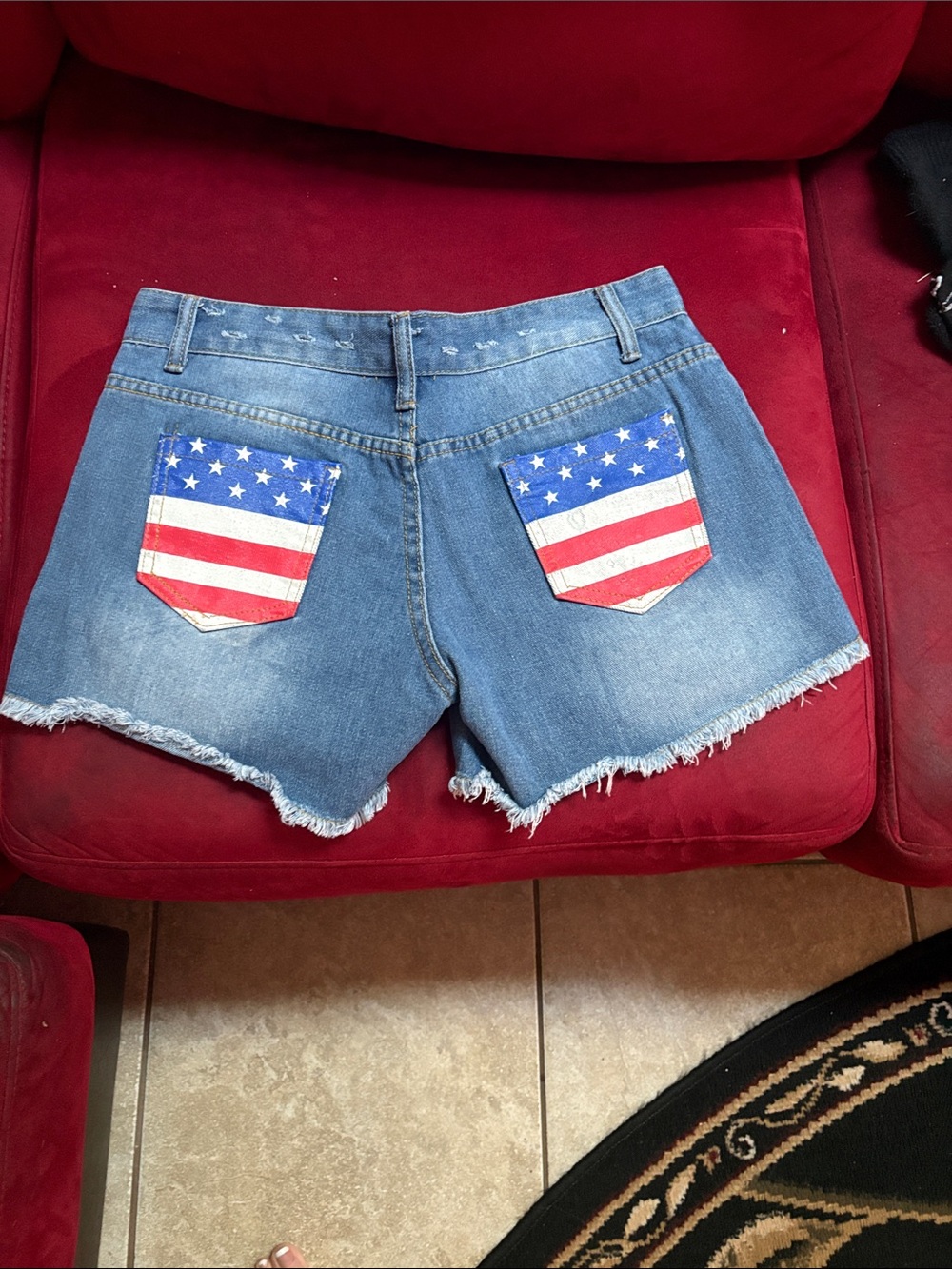 Blue Denim Women's Cutoff Shorts with Flag Pocket Accents